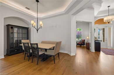 Dining room featuring ornamental molding, light ha