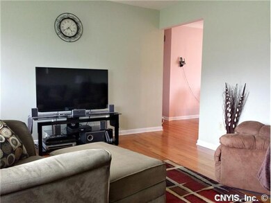 Living Room. Gleaming hardwood floor thru the firs
