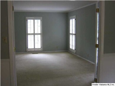 Looking from the dining room into the living room