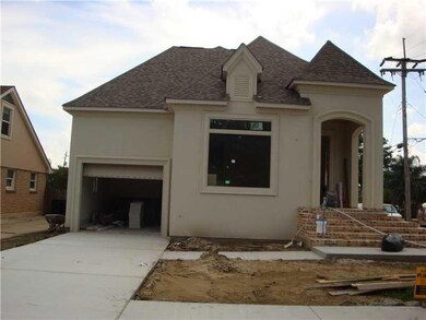 Photo. Front Garage and entrance
