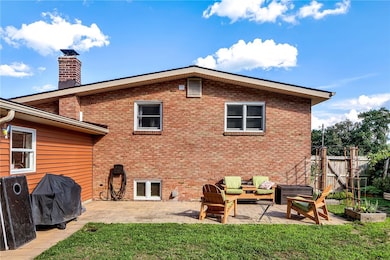 The patio space is a great spot for grilling and e