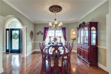 Formal dining is large and overlooks the horse pasture. It adorns a beautiful Swarovski Chandelier and gorgeous hardwood floors. The room has 2 insets to put Vases or Lamps .Check Virtual tour for additional photos of the Dining room.