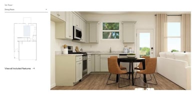 Kitchen with white microwave, gas range, light countertops, light wood-type flooring, and a sink