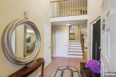 Entry FoyerStep into the impressive 2-story entry foyer that leads into the main living area of the home.
