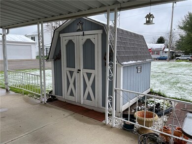 CARPORT/STORAGE SHED