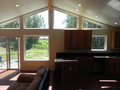 Vaulted Ceiling w/ Wall of Windows