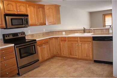Kitchen. Tile floors, stainless appliances, lots o