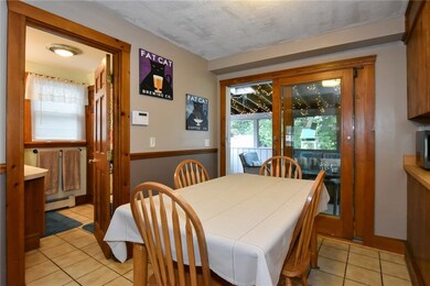 Eat in Kitchen with view of full bath and slider t