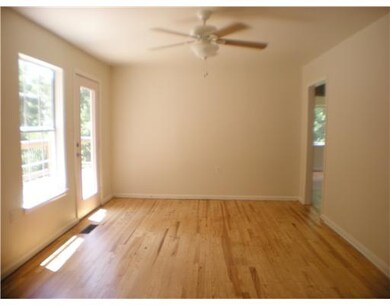 Living Room. Beautiful wood floors.