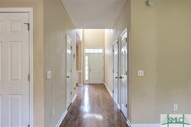 Hallway leading to front entry