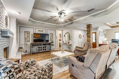Living room featuring light hardwood / wood-style 