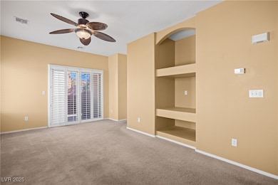Unfurnished bedroom featuring baseboards, carpet f