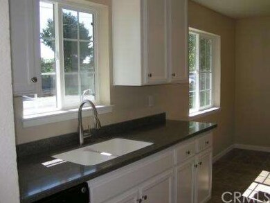 Corian countertops, with integrated sink.