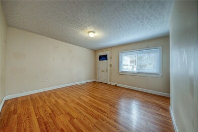 First Fl bedroom or use as a living room. Approx. size 13'x13'.