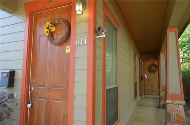 View of exterior entry featuring a porch