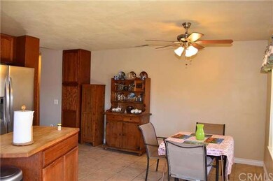 More kitchen showing the generous dining area