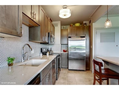 Quartz counters, custom cabs with soft close, stai