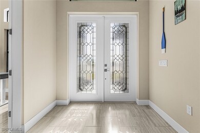 Entryway featuring french doors