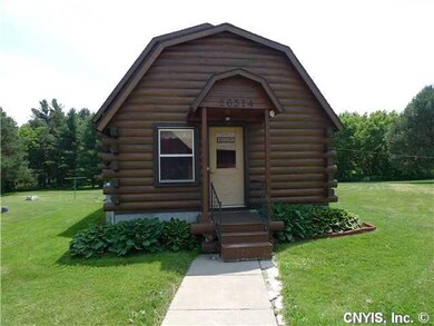 Exterior Front. Entry door leads into mudroom.