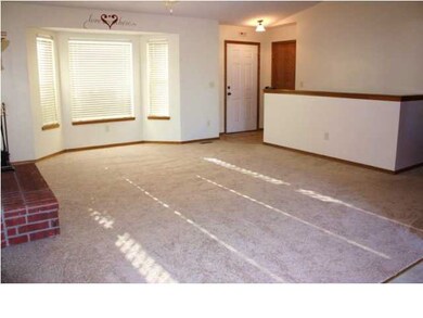 OPEN FLOOR PLAN....LIVING ROOM VIEW FROM THE DININ