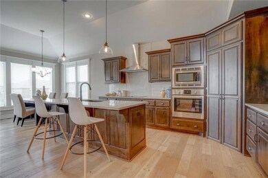 KITCHEN ISLAND & DINING AREA