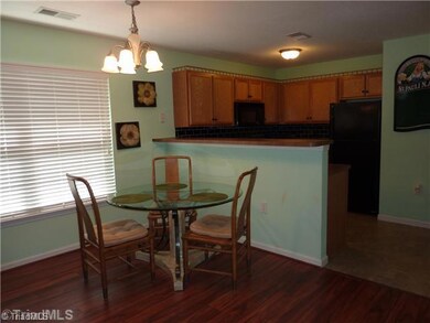 Dining Room. You could also have tall bar stools for added dining space.