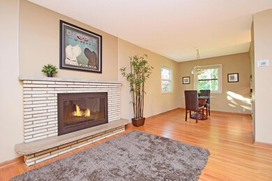 The formal dining room also features hardwood floors and two windows overlooking the yard. It is handy to the kitchen and large enough for the whole crew!