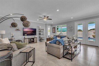 Spacious GREAT ROOM featuring french doors and a p