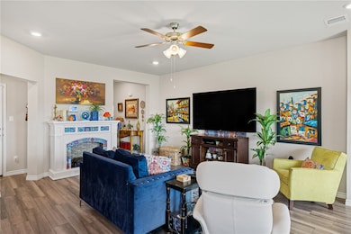 Living area featuring wood finished floors, ceilin