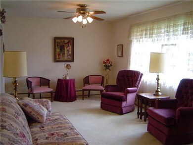 Living Room. Large window brightens room!