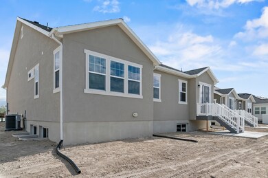 View of side of property with stucco siding