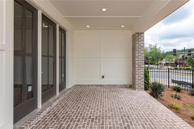 View of patio / terrace with fenced front yard . N