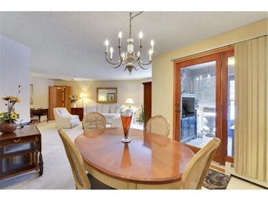 Dining room adjoins delightful three seasons porch