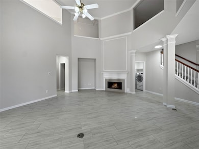 Soaring ceilings, fresh paint and tile flooring.