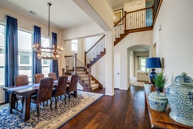 Formal dining room with Restoration Hardware light fixture