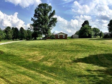 Home set off of Hwy 52W convenient to I-65