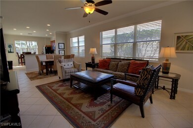 great room with tile on the diagonal, crown moldin