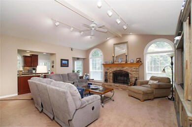 Vaulted Great Room off Kitchen with wood burning f