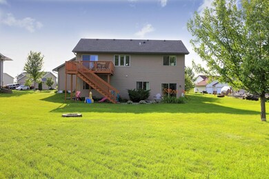 Huge backyard has everything you need - deck, walk