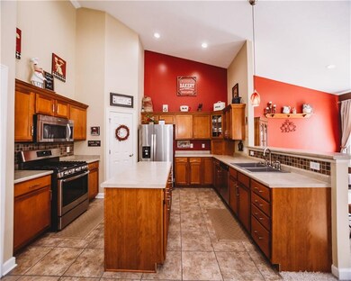 Newer gas range! One of the few gas stoves in the neighborhood! Kitchen and dining area have plenty of recessed lights.