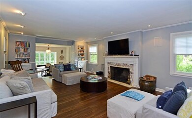 Warm and inviting, the living room showcases a mar