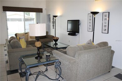 living room overlooking the pool