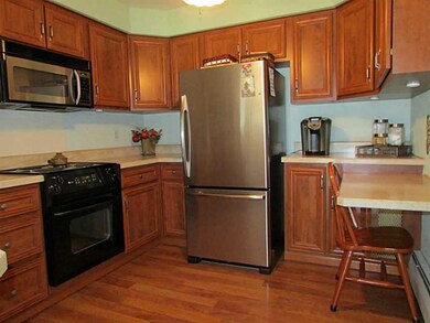 Kitchen. Floors continue into remodeled kitchen wi