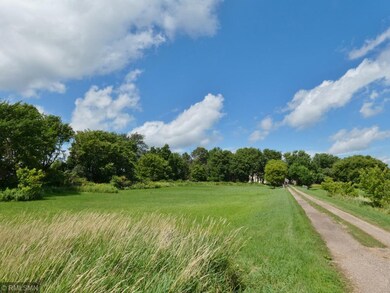 The home and buildings are nestled privately amid 