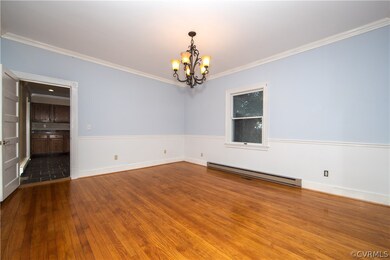 The formal dining room also has a beautiful crown