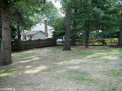 Exterior Back - Large back yard with mature trees 