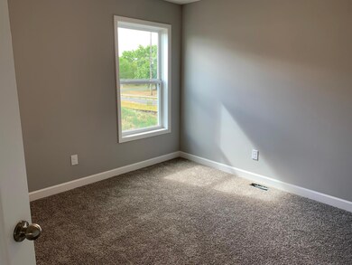 Each of the home secondary bedrooms are perfectly sized and all feature big closets! Model photo.