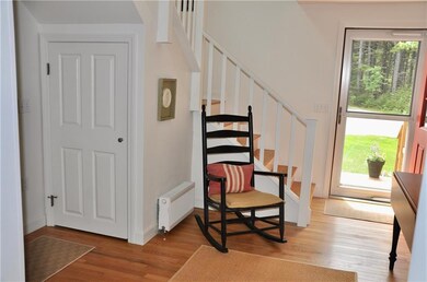 Mudroom entrance and stairs to...