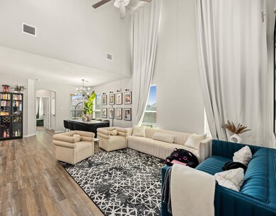 Living room with floor to ceiling windows