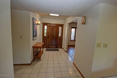 Handsome Wood Door to Entry Foyer